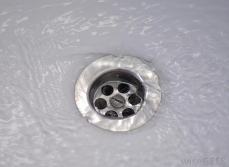 water-going-down-shower-drain.jpg